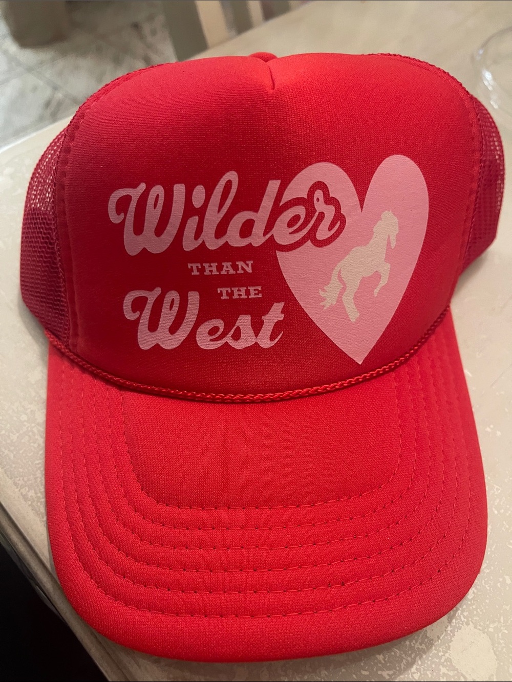 Wilder Than The West Red Trucker Hat